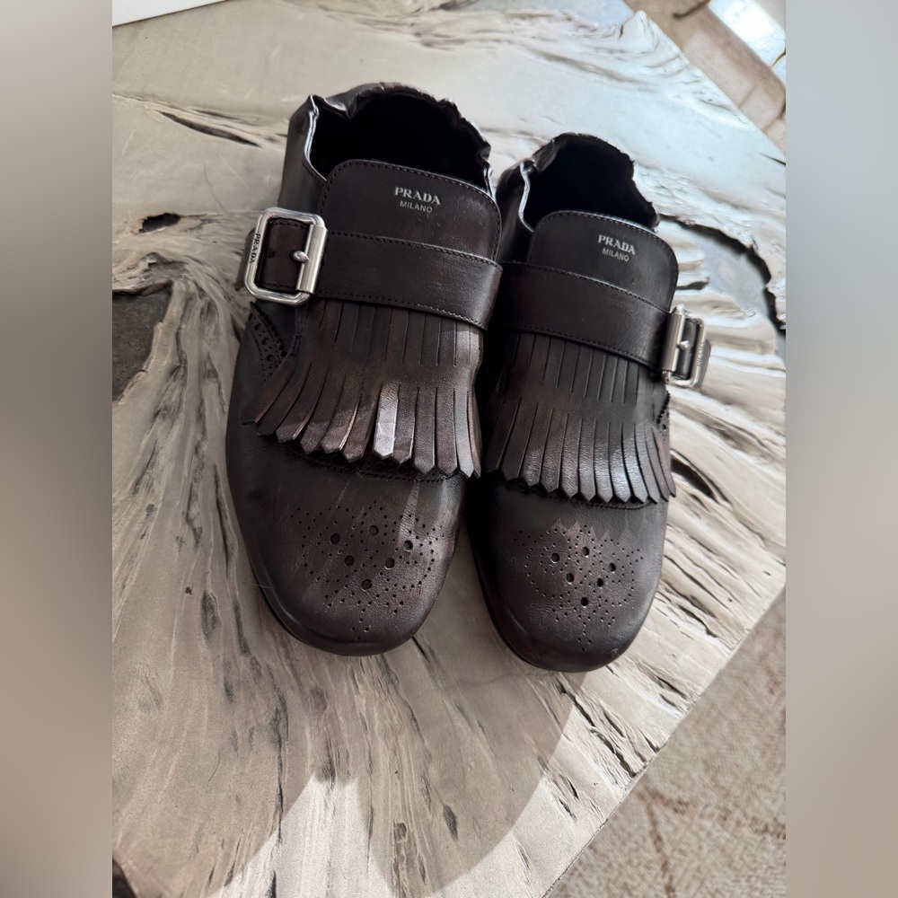 Prada Shuffle leather shoes with buckle